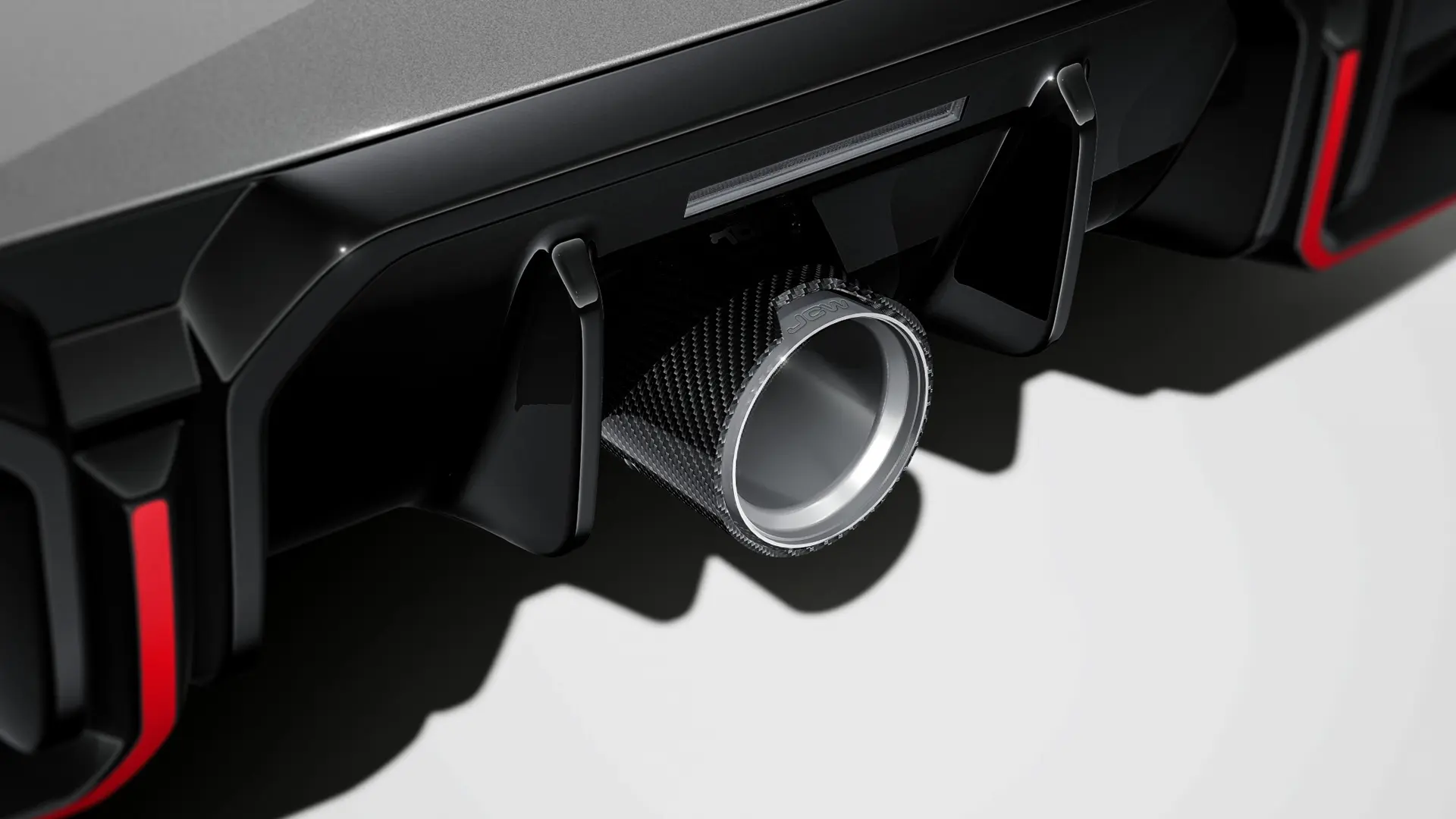 Accesorios JCW - Difusor trasero JCW en brillo intenso.